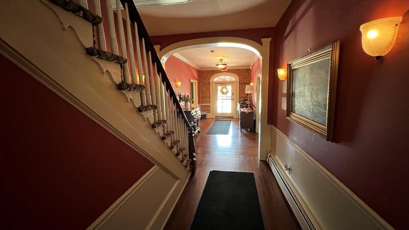 Inside hallway leading to entrance