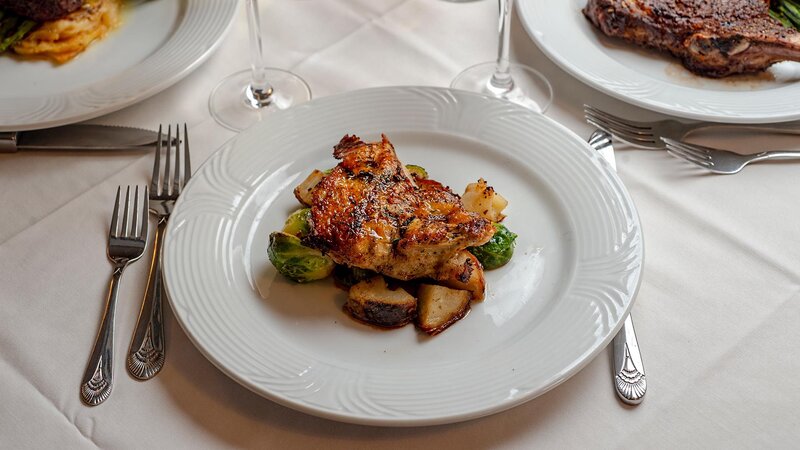 Chicken entree with potatoes and brussels sprouts