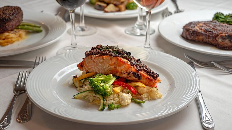 Salmon entree with jasmine rice and vegetable medley